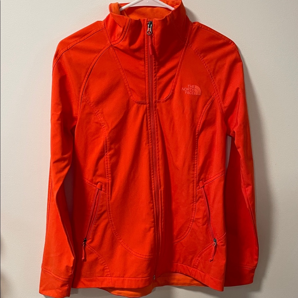 The North Face women’s soft shell Orange Jacket